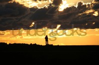 understocks-man-sunset-clouds-romantic-dark-free-photo-stock